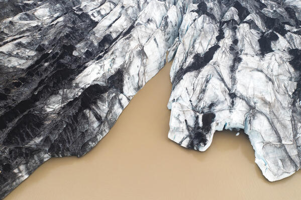 aerial vertical view taken by drone of Sólheimajökull glacier during a summer day, Sudurland, Iceland, Europe 
