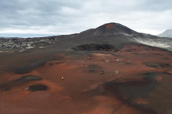 a person enjoys the landscape near a icelandic volcanic area, Vesturland, Iceland, Europe