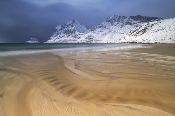 a long exposure to capture the afternoon light at Haukland beach during an winter day, Vestvagoy, Lofoten island, Norway, Europe