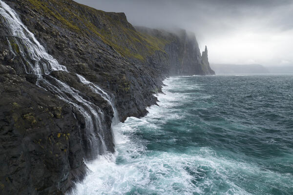 aerial view, taken by drone of Trollkonufingur or Witches Finger, Sandavagur, Vagar, Faroe Islands, Denmark, Scandinavia, Europe