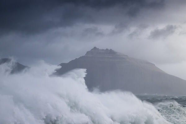 Kalsoy island shooted from Gjogv during an autumn sea storm, Faroe Islands, Denmark, Scandinavia