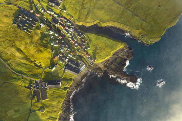 aerial vertical view taken by drone of little village called  Gjogv during an autumn day, Eysturoy, Faroe Island, Denmark, Europe
