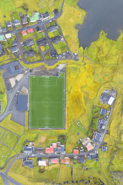 aerial vertical view taken by drone of football court near to Eidi village, Eysturoy, Faroe Island, Denmark, Europe