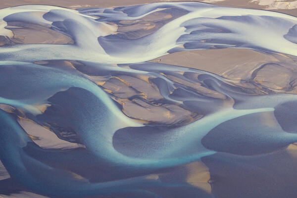 aerial abstract view taken by drone of icelandic river during a summer day, Southern Iceland, Europe