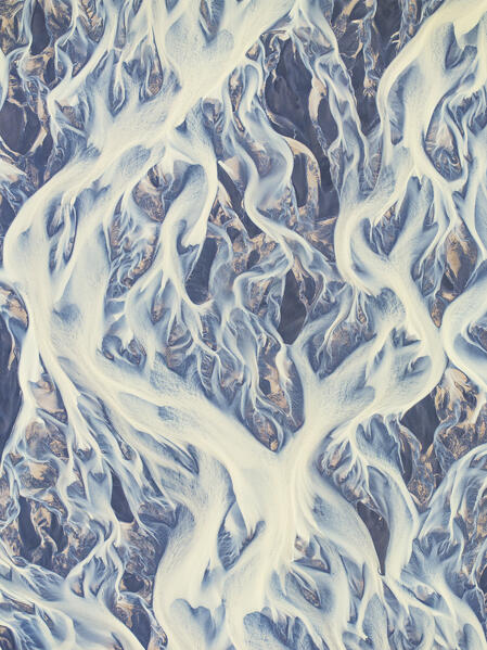 aerial abstract view taken by drone of icelandic river during a summer day, Southern Iceland, Europe
