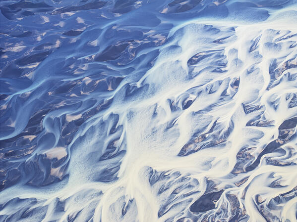 aerial abstract view taken by drone of icelandic river during a summer day, Southern Iceland, Europe