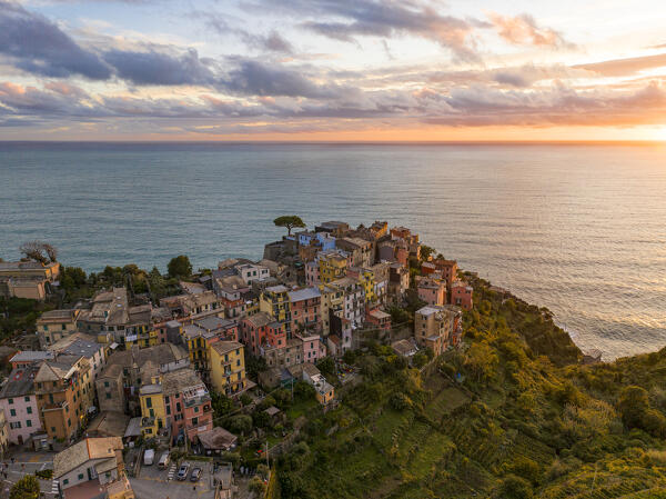 aerial view taken by drone of iconic village of Corniglia during a sunset, Cinque Terre National Park, La Spezia province, Liguria, Italy, Europe