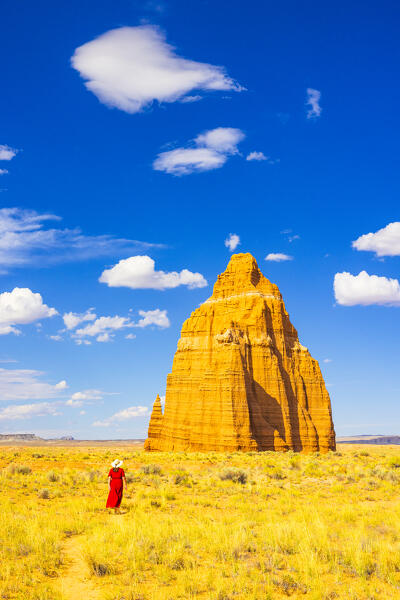 a girl enjoy the beautiful view of the Temple of the Sun on the Capitol Reef National Park during a sunny summer day, Utah, United States of America