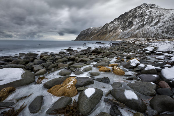 sea scape in Vareid whit Hustinden mountain, municipality of Flakstad, Lofoten Island, Norway, Europe