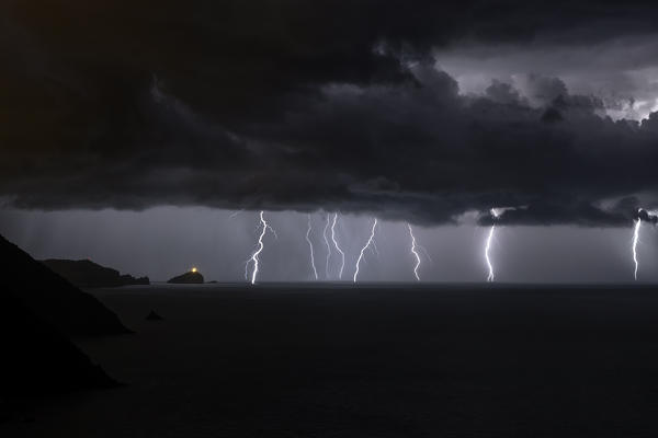 lightning on Tino Island on summer night, municipality of Porto Venere, La Spezia province, Liguria district, Italy, Europe