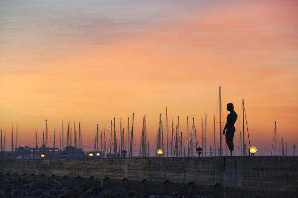 Lisippo in Fano, pink sunrise, Pesaro Urbino, Le Marche, Italy                               