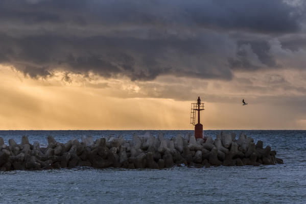 Fano headlight in a stormy atmosphere, Pesaro Urbino, Marche, Italy