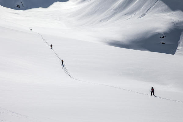Ski mountainering in Bondone valley, Orobie alps, Lombardy, italy