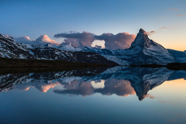 Clouds at the Matterhorn reflected on the Stellisee, Vallese, Switzerland