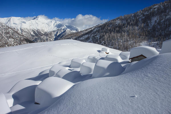 Lombardy, snowy winter to Lendine alp at Chiavenna valley, Valtellina, Italy