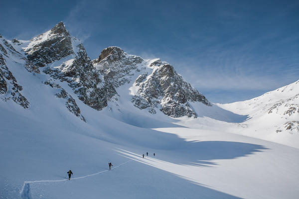 Ski mountaineers in Agnel valley, Engiadin, Switzerland