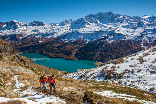 Switzerland, trekking at Engiadin, in the backgrond Silvaplana lake at Corvatsch peak 