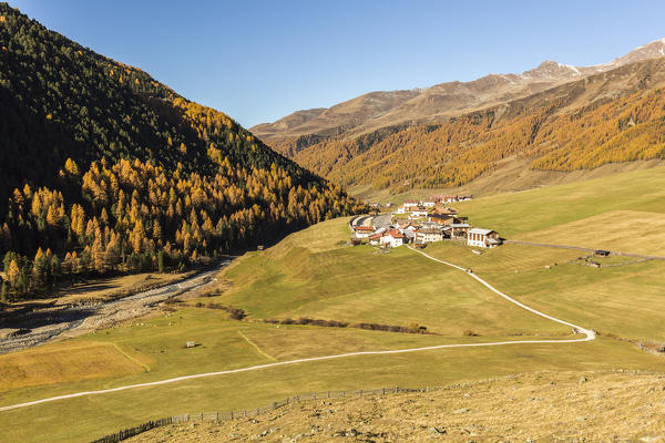 The alpine village of Melago during autumn, Vallelunga, Venosta Valley, province of Bolzano, South Tyrol, Italy

