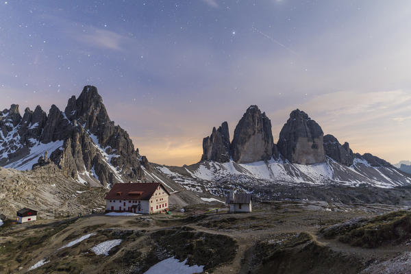 Starry sky on Locatelli Refuge and Tre Cime Di Lavaredo (Drei Zinnen), Sexten Dolomites, South Tyrol, Italy