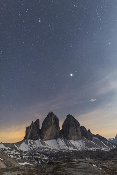 Stars above rocky peaks of Tre Cime Di Lavaredo (Drei Zinnen), Sexten Dolomites, South Tyrol, province of Bolzano, Italy