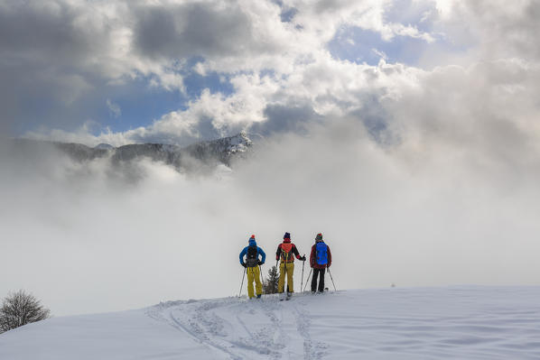 Ski mountaineers on Monte Colombana, Gerola Valley, Sondrio province, Valtellina, Lombardy, Italy