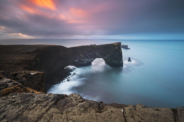 Dyrhólaey arch at sunrise, Vík í Mýrdal, southern Iceland, Iceland, Northern Europe