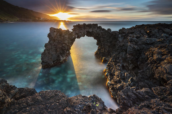 Sunset at Faja da Ribeira da Areia and its arch, Sao Jorge, Azores, Portugal, Western Europe