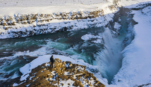 A man observes gullfoss from above, Hrunamannahreppur, Árnessýsla, Suðurland, Iceland, Northern europe