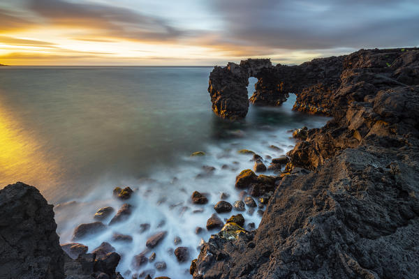 Sunset at Faja da Ribeira da Areia and its arch, Sao Jorge, Azores, Portugal, Western Europe