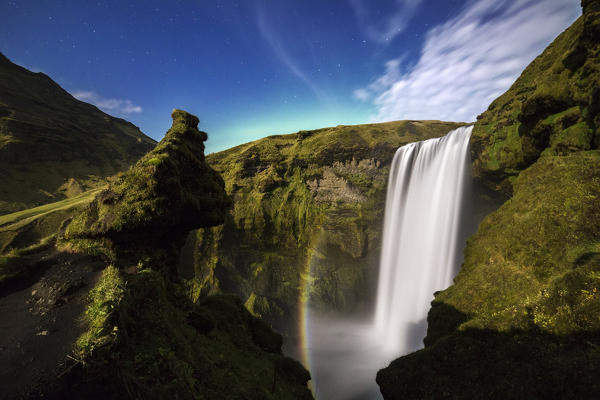 Moonbow and northern lights at Skógafoss, Skógar, Iceland, Northern Europe 