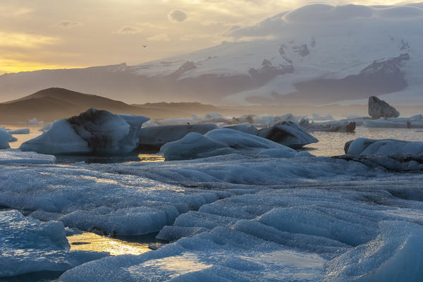 Blocks of ice at sunset, Jökulsárlón, Diamond beach, Austurland, Iceland, Northern Europe