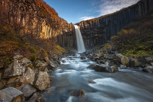 Svartifoss waterfall at sunrise, Skaftafell National Park, Hornafjörður, Austurland, Iceland, Northern Europe