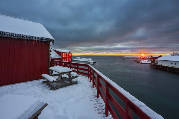 Sunrise from a rorbuer balcony, A I Lofoten, Moskenes, Moskenesoya, Nordland, Lofoten, Norway, Northern Europe