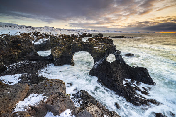 Gatklettur arch at sunrise, Arnarstapi, Hellnar,  Snæfellsnes Peninsula, Iceland, Northern Europe