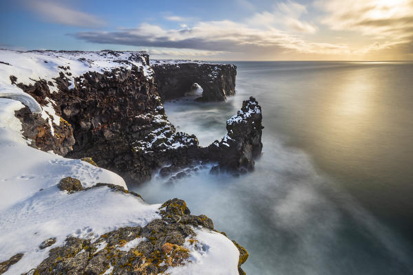 Sunset at Svortuloft cliffs, Hellisandur, Snæfellsnes peninsula, Iceland, Northern Europe
