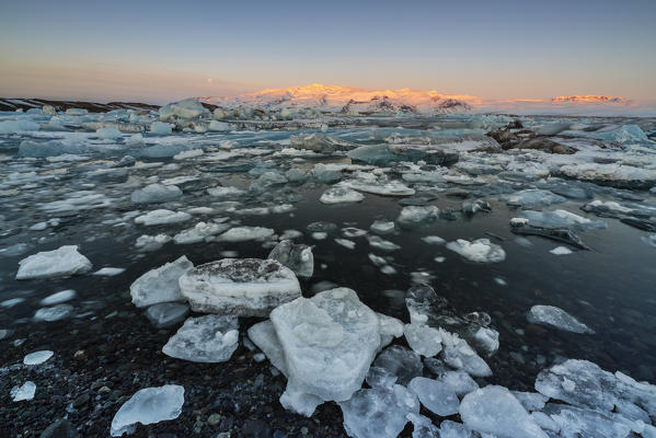 Blocks of ice at sunrise, Jökulsárlón, Diamond beach, Austurland, Iceland, Northern Europe
