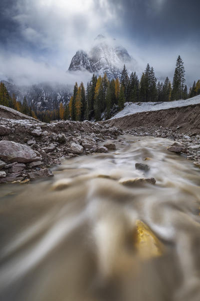 Cima del Laudo in the clouds during autumn, Belluno, Veneto, Italy, Western Europe