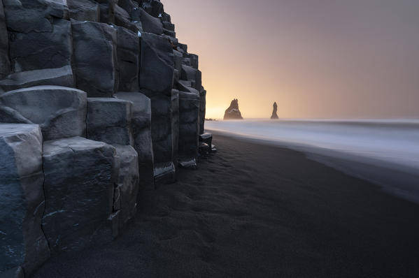 Basaltic columns and Reynisdrangar​ at Reynisfjara during sunrise, Vík í Mýrdal, southern Iceland, Iceland, Northern Europe