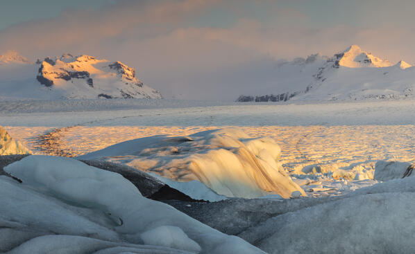 Blocks of ice at sunrise, Jökulsárlón, Diamond beach, Austurland, Iceland, Northern Europe