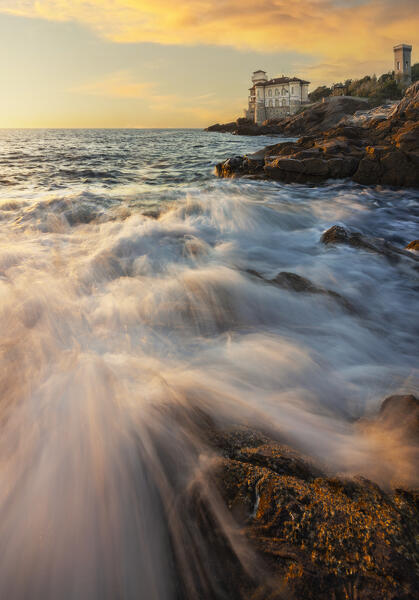 Waves during sunset at Castello del Boccale, Livorno, Tuscany, Italy, Southern Europe