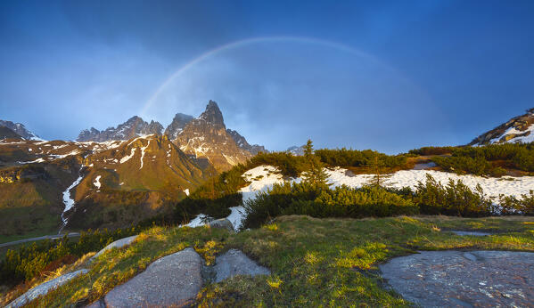Pale di San Martino from Cavallazza at sunset with rainbow, Parco Naturale Paneveggio Pale di San Martino, Lagorai chain, Trento, Trentino Alto Adige, Italy, Southern Europe