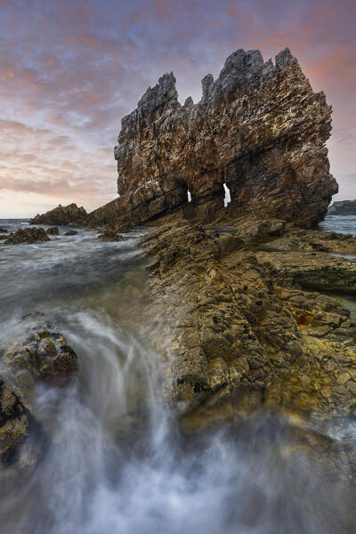 Famous rock at Portizuelo beach at sunset, Valdes, Luarca, Asturias, Spain, Western europe