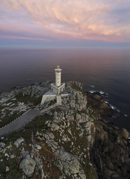 Aerial view of Punta Nariga lighthouse at sunrise, Costa da Morte, Galicia, Spain, Iberian Peninsula, Western Europe