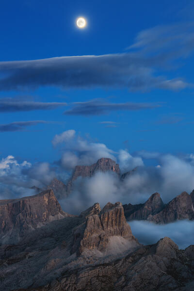 Monte Pelmo Averau and Ra Gusela at dusk with moon viewed from Lagazuoi during summer, Dolomiti di Zoldo, Belluno, Veneto, Italy, Southern Europe