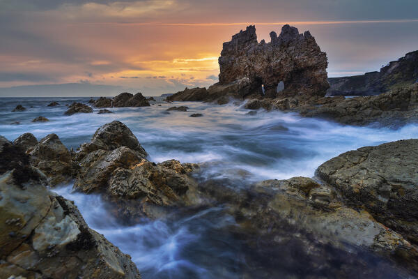 Famous rock at Portizuelo beach at sunrise, Valdes, Luarca, Asturias, Spain, Western europe