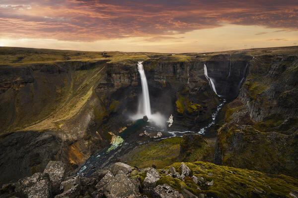 Person at Hifoss waterfall during summer at sunset, Fossa river, Iceland, Northern Europe 