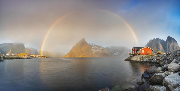 Panoramic view of a rainbow at Sakrisoy and Olstind, Moskenes, Moskenesoya, Nordland, Lofoten, Norway, Northern Europe