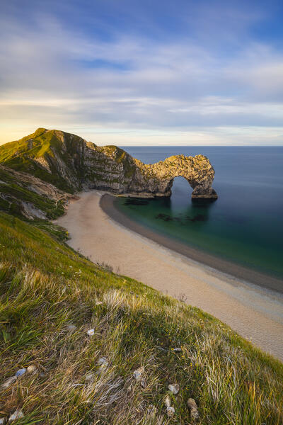 Durdle Door at sunrise, Durdle Door, Jurassic Coast, Dorset, United Kingdom, Northern Europe