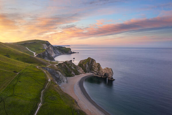 Aerial view of Durdle Door at sunrise, Durdle Door, Jurassic Coast, Dorset, United Kingdom, Northern Europe