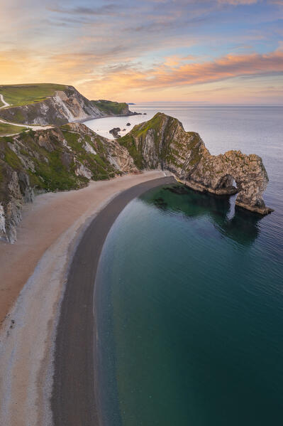 Aerial view of Durdle Door at sunrise, Durdle Door, Jurassic Coast, Dorset, United Kingdom, Northern Europe
